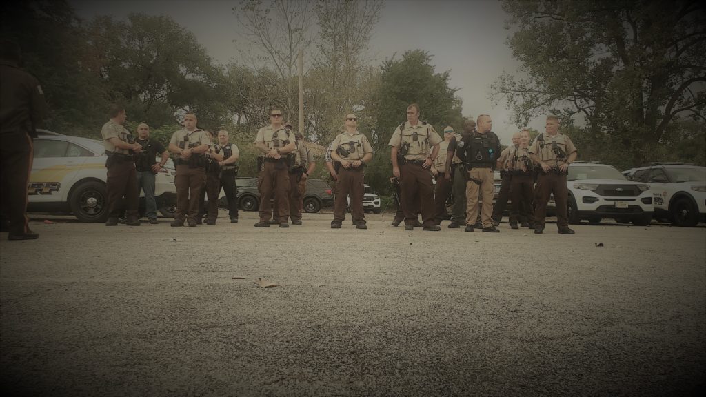 Cook County Sheriff's Police conduct roll call in Robbins, IL amid village turmoil