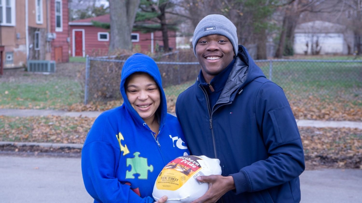 Pictured: Alderman Tolbert with a Turkey Recipient from a previous giveaway event.